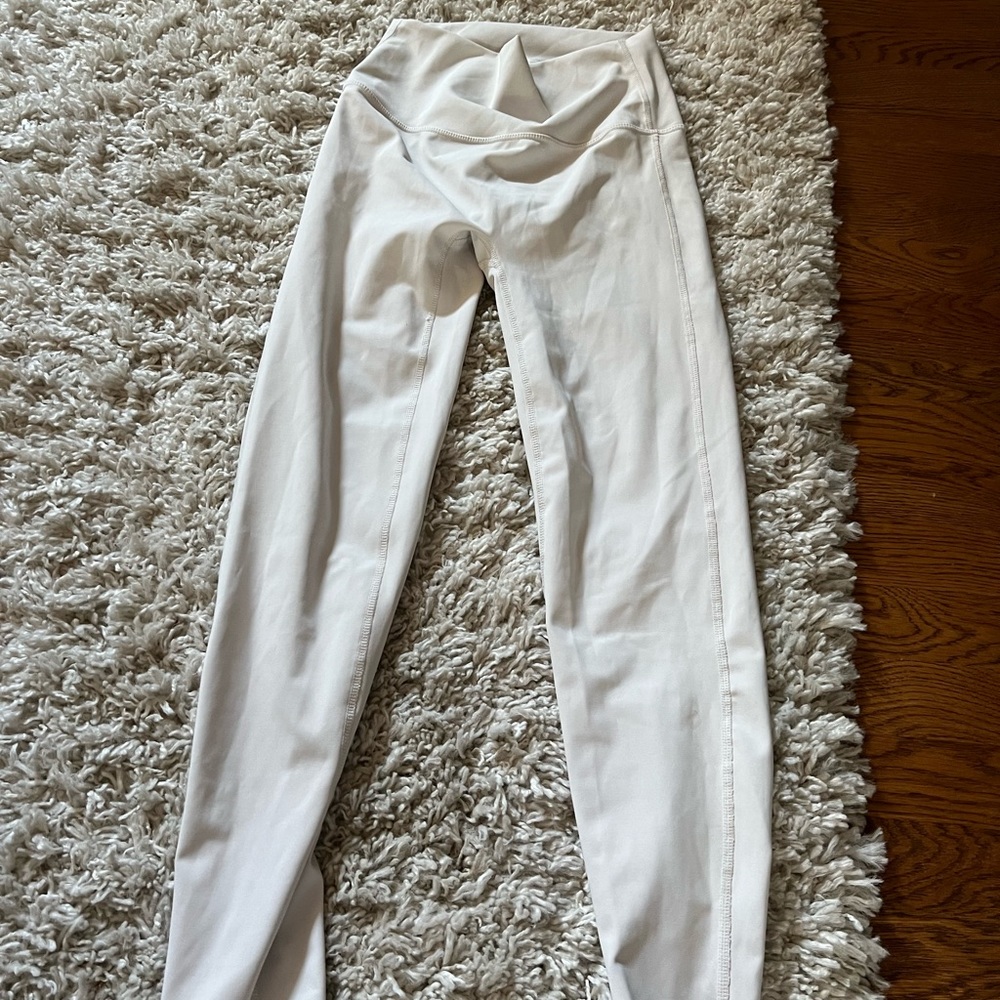 White leggings size medium (never worn)
